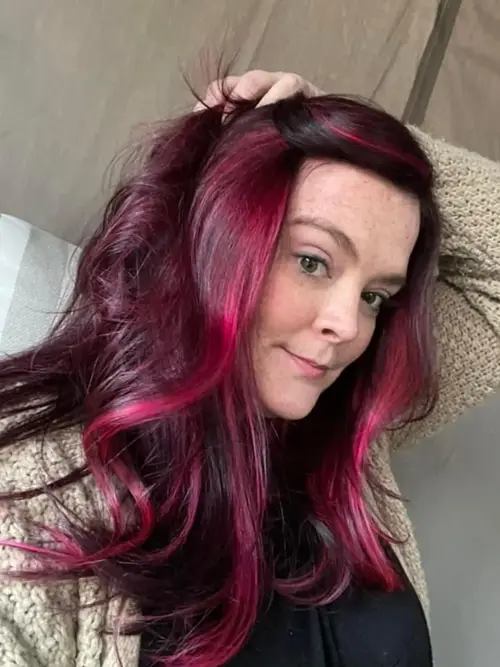 Denver Hair Extensions This peekaboo highlight features bright fuchsia hidden through a deep wine re(..)
