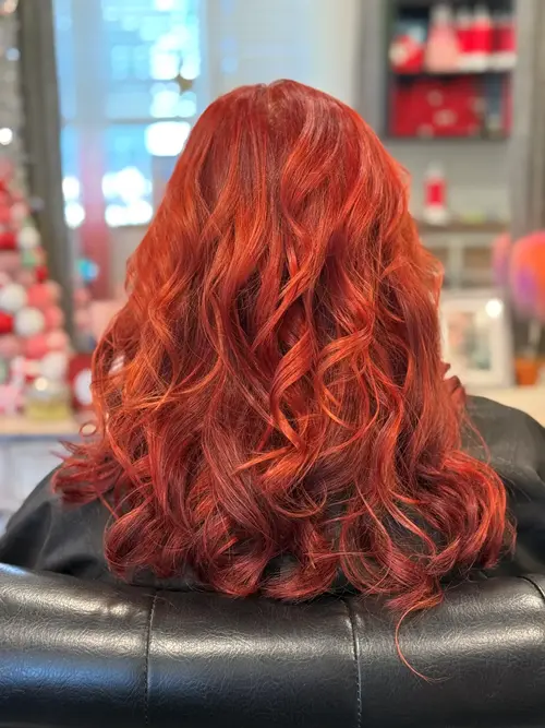 Hair Extensions photo, Denver Colorado. Cherry bomb with a splash of orange. This is a mixture of a (..)